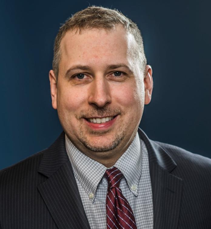 A photo of John Strang, PsyD.